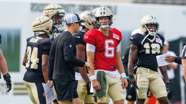 Jul 30, 2025; New Orleans, LA, USA; New Orleans Saints quarterback Tyler Shough (6) talks to New Orleans Saints quarterback coach Scott Tolzien during training camp at Ochsner Sports Performance Center. Mandatory Credit: Stephen Lew-Imagn Images
