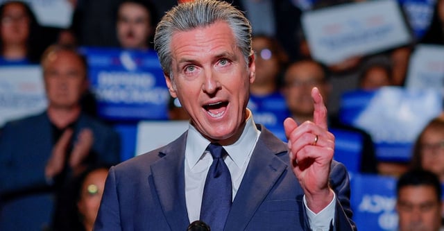 California Governor Gavin Newsom, along with local congressional representatives, state officials and supporters, speaks as he announces the redrawing of California's congressional maps, calling on voters to approve a ballot measure, in response to a similar move in Texas being supported by U.S. President Donald Trump, in Los Angeles, California, U.S., August 14, 2025. REUTERS/Mike Blake