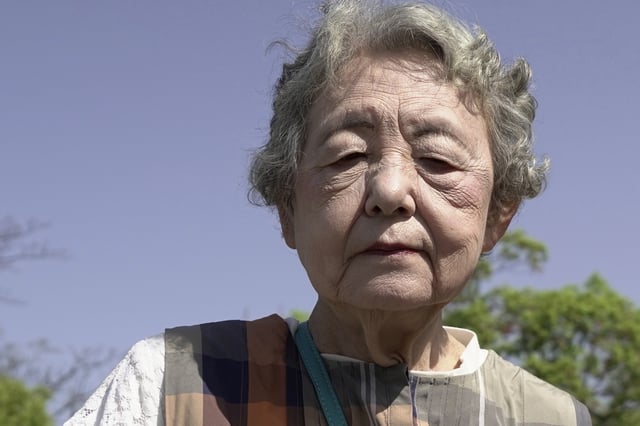 Atomic bomb survivor, Fumiko Doi, speaks during an interview with The Associated Press at Nagasaki Peace Park on April 21, 2025 in in Nagasaki, southern Japan. (AP Photo/Mayuko Ono)
