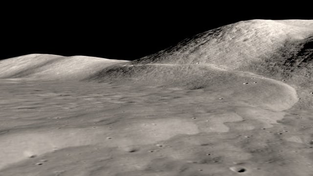 A scene from a visualization of the Lee-Lincoln scarp in Taurus-Littrow on the Moon. This scarp is evidence of moonquakes that sent rocks and landslides across the surface. Seismometers left on the Moon by Apollo astronauts recorded hundreds of events between 1969 and 1977, including 28 shallow moonquakes. The study narrowed the locations of these quakes and found that many of them occurred near scarps, implying that the forces creating the scarps also caused the quakes, and they continue to shape the lunar surface. The Lee-Lincoln scarp was only about 13 kilometers from one of the epicenters identified by the scientists. Credit: NASA's Scientific Visualization Studio