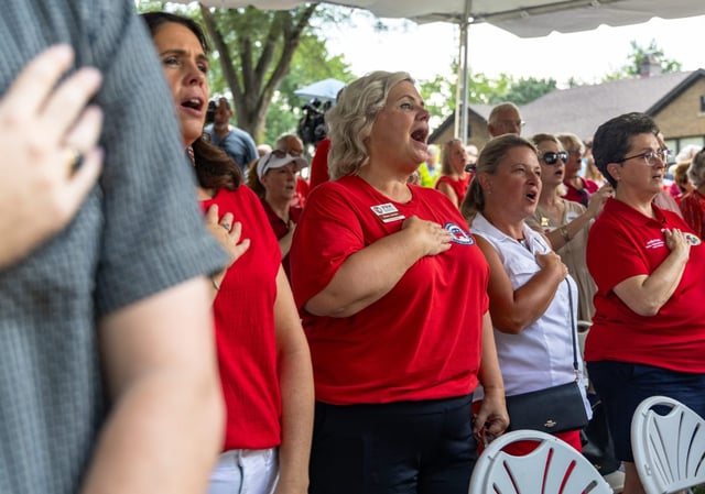 Audience members sing the National Anthem during Republican Day at the Illinois State Fair on Aug. 14, 2025, at the  fairgrounds in Springfield. (Dominic Di Palermo/Chicago Tribune)