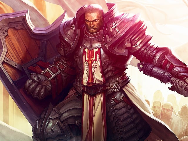 A hulking crusader character from Diablo 3 Reaper of Souls. He is standing in front of a crowd of people bathed in sunlight and armed with a massive shield and mace and covered in dark plated armor.