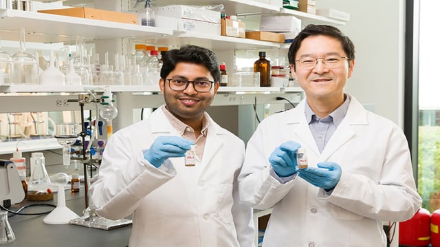 FSU scientists Arijit Ghorai and Ho Yong Chung hold samples of lignin-based polyurethane.