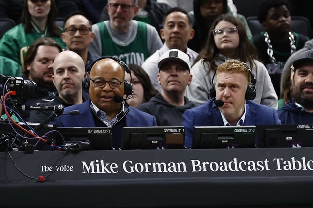 Mar 5, 2025; Boston, Massachusetts, USA; Mike Tirico, left, broadcast the game between the Boston Celtics and the Portland Trail Blazers with NBC Sports Boston analyst Brian Scalabrine during the first quarter at TD Garden. Mandatory Credit: Winslow Townson-Imagn Images