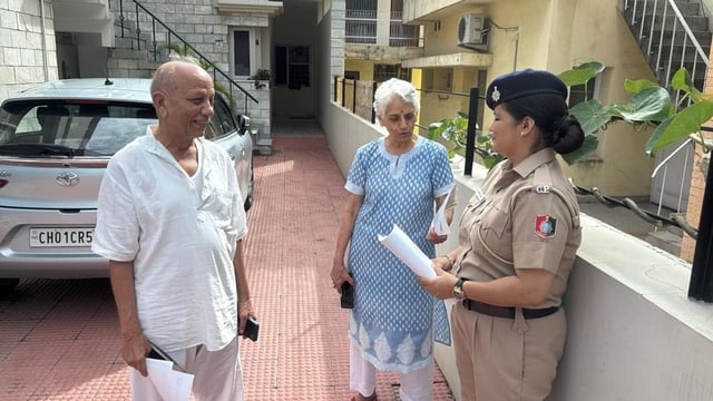 Cyber police sensitising elderly residents during a door-to-door awareness drive on digital arrest frauds in Chandigarh on Thursday. (HT Photo)
