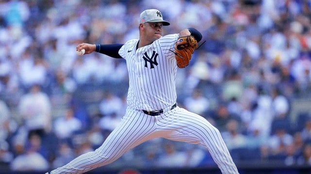 May 17, 2025; Bronx, New York, USA; New York Yankees relief pitcher Fernando Cruz (63) pitches against the New York Mets during the ninth inning at Yankee Stadium. Mandatory Credit: Brad Penner-Imagn Images