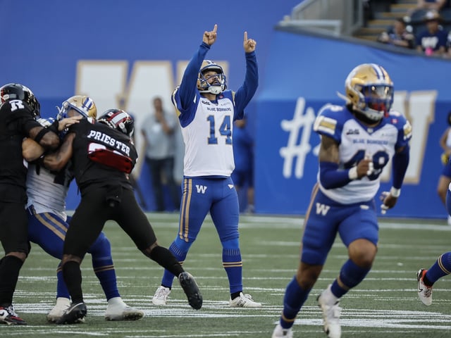 Winnipeg Blue Bombers kicker Sergio Castillo (14) celebrates his field goal against the Ottawa Redblacks during first half CFL action in Winnipeg Thursday, August 14, 2025.    THE CANADIAN PRESS/John Woods