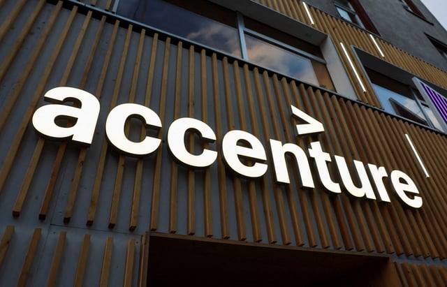 The logo of Accenture is displayed on a building, on the first day of the annual meeting in Davos, Switzerland, January 15, 2024. REUTERS/Denis Balibouse/File Photo