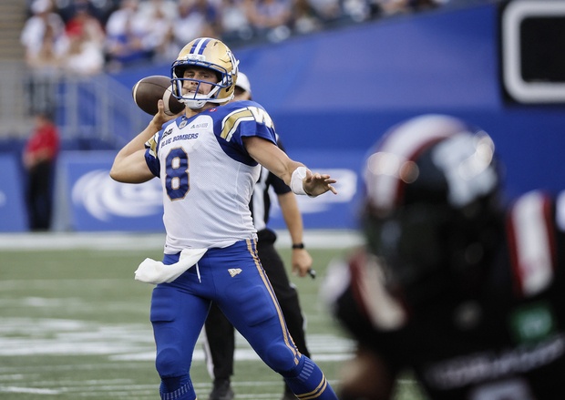 Winnipeg Blue Bombers quarterback Zach Collaros (8) gets set to throw a touchdown pass to Jerreth Sterns against the Ottawa Redblacks during first half CFL action in Winnipeg Thursday, August 14, 2025.    