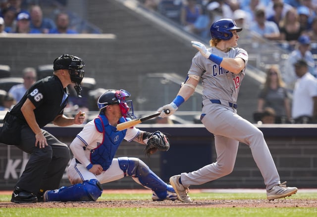TORONTO, ON - AUGUST 14: Owen Caissie #19 of the Chicago Cubs swings during his major league debut game against the Toronto Blue Jays during the seventh inning in their MLB game at the Rogers Centre on August 14, 2025 in Toronto, Ontario, Canada. (Photo by Mark Blinch/Getty Images)
