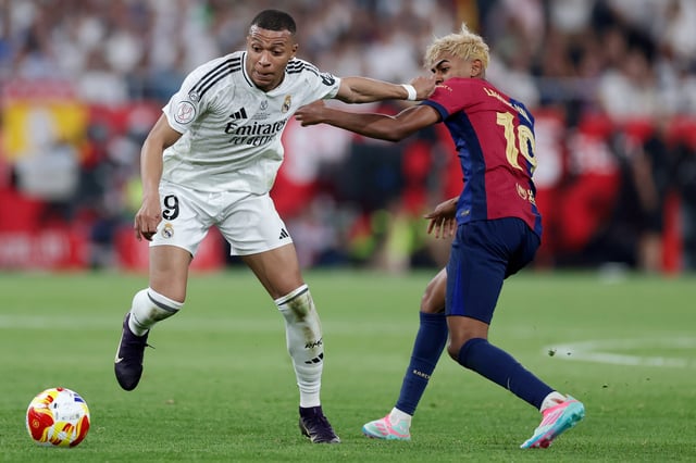 Kylian Mbappe of Real Madrid, Lamine Yamal of FC Barcelona during the Spanish Copa del Rey match between Real Madrid v FC Barcelona at the Estadio de la Cartuja on April 26, 2025 in Sevilla Spain.