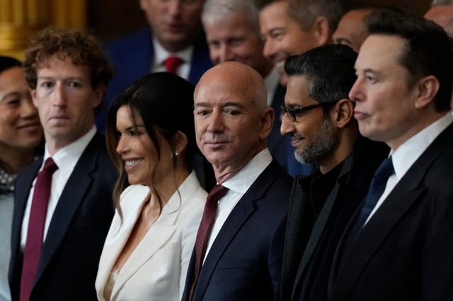 TOPSHOT - Guests including Mark Zuckerberg, Jeff Bezos, Sundar Pichai and Elon Musk, arrive before the 60th Presidential Inauguration in the Rotunda of the U.S. Capitol in Washington, Monday, Jan. 20, 2025. (Photo by Julia Demaree Nikhinson / POOL / AFP) (Photo by JULIA DEMAREE NIKHINSON/POOL/AFP via Getty Images)