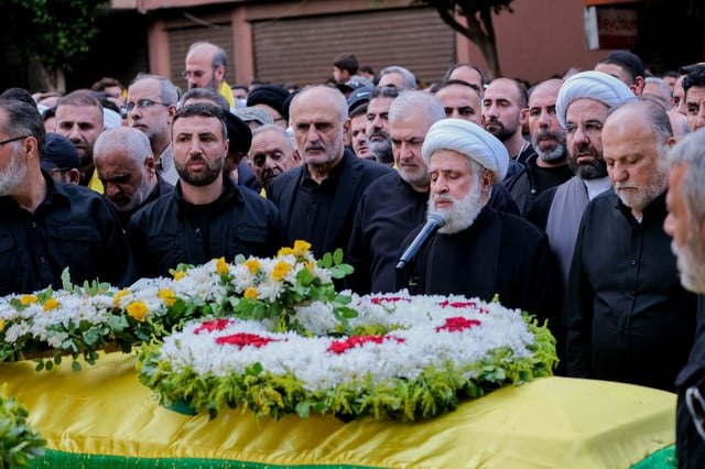 Naim Qassem, Hezbollah&#39;s second in command, addresses the crowd at the funeral of Ibrahim Aqil, the Hezbollah Radwan Forces commander, and Mahmoud Hamad, another Hezbollah commander, both killed in an Israeli airstrike on a residential building in the southern suburb of Dahiyeh in Beirut, Lebanon.