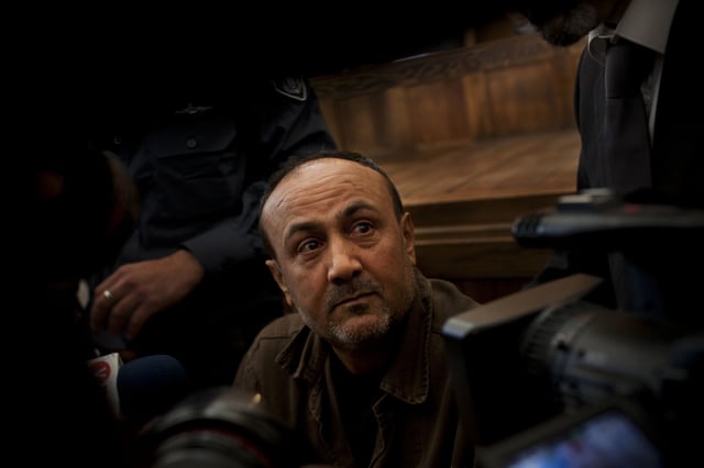 FILE - In this Jan. 25, 2012, file photo, senior Fatah leader Marwan Barghouti appears at Jerusalem's court. (AP Photo/Bernat Armangue, File)