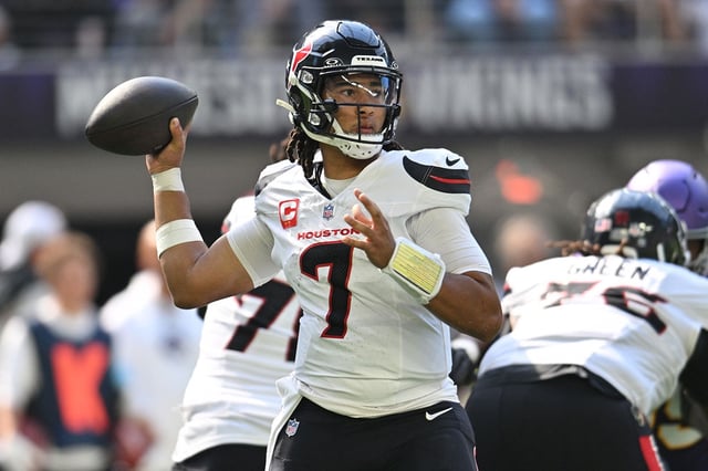 Sep 22, 2024; Minneapolis, Minnesota, USA; Houston Texans quarterback C.J. Stroud (7) throws a pass against the Minnesota Vikings during the second quarter at U.S. Bank Stadium. Mandatory Credit: Jeffrey Becker-Imagn Images