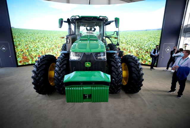 The John Deere 8R autonomous tractor is displayed at the Las Vegas Convention Center during CES 2022 in Las Vegas, Nevada, U.S., January 6, 2022. REUTERS/Steve Marcus/File Photo