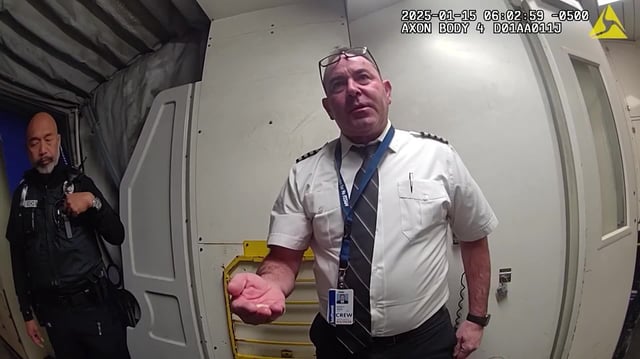 Video shows police detain alleged drunken pilot