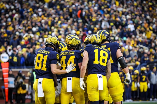 Michigan offensive players in the huddle during a game against the on Nov. 23, 2024  in Ann Arbor, Mich.