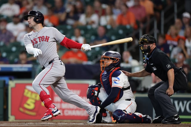 HOUSTON, TEXAS - AUGUST 12: Alex Bregman #2 of the Boston Red Sox bats during the first inning against the Houston Astros at Daikin Park on August 12, 2025 in Houston, Texas.