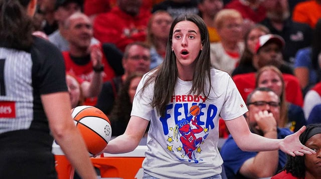 Indiana Fever guard Caitlin Clark (22) reacts to a call from the referee Tuesday, Aug. 12, 2025, during the game at Gainbridge Fieldhouse in Indianapolis. The Dallas Wings defeated the Indiana Fever, 81-80. © Grace Hollars/IndyStar / USA TODAY NETWORK via Imagn Images