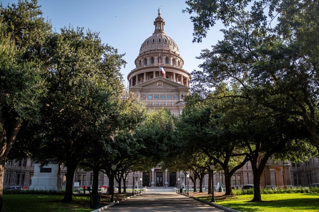 The exterior of the Texas Capitol on the day of a special session of the Texas House after Democratic lawmakers left the state to deny Republicans the opportunity to redraw the state's 38 congressional districts, in Austin, Texas, U.S., August 13, 2025.    REUTERS/Sergio Flores