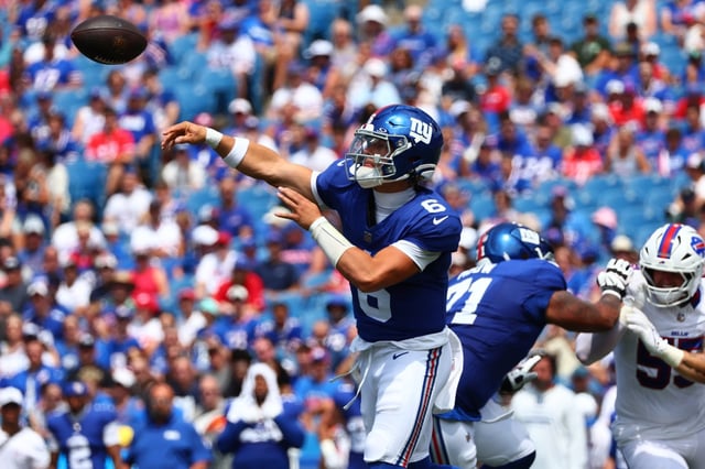 New York Giants quarterback Jaxson Dart (6) throws a pass during the first half of an NFL preseason football game against the Buffalo Bills Saturday, Aug. 9, 2025, in Orchard Park, N.Y. (AP Photo/Jeffrey T. Barnes)