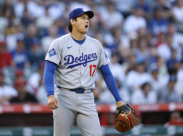 ANAHEIM, CALIFORNIA - AUGUST 13: Shohei Ohtani #17 of the Los Angeles Dodgers reacts to a Los Angeles Angels out during the first inning at Angel Stadium of Anaheim on August 13, 2025 in Anaheim, California. (Photo by Harry How/Getty Images)