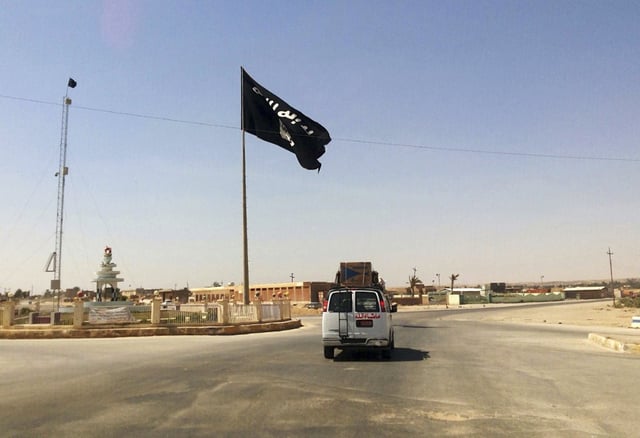 Islamic State flag, Rawah, Iraq, July 22, 2014, (AP Photo/File)