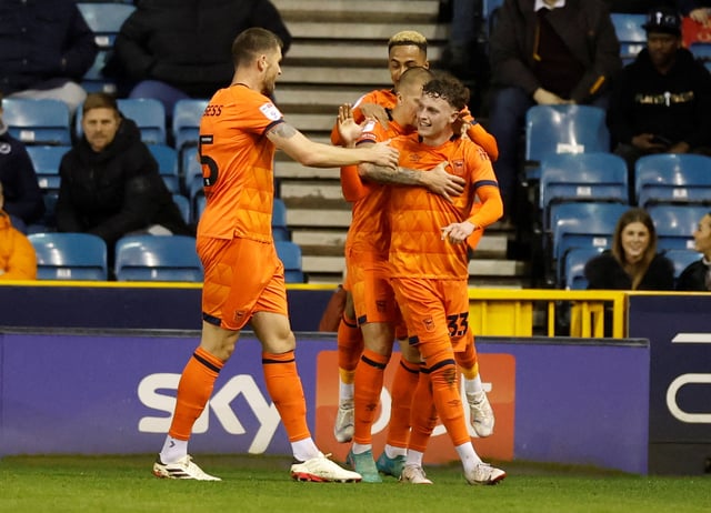 Soccer Football - Championship - Millwall v Ipswich Town - The Den, London, Britain - February 14, 2024 Ipswich Town’s Nathan Broadhead celebrates scoring their first goal with teammates Action Images/Peter Cziborra/File Photo