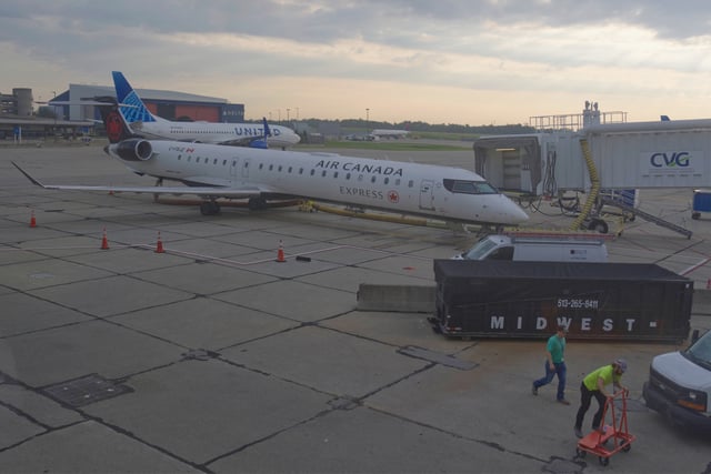 An Air Canada Express Bombardier CRJ900 operated by Jazz Aviation LP sits on the tarmac at Cincinnati/Northern Kentucky International Airport outside of Hebron, Ky., Friday, Aug. 15, 2025. (AP Photo/Jon Gambrell)