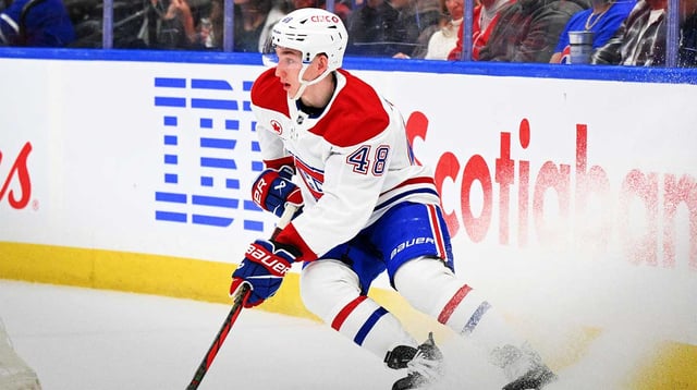 Apr 12, 2025; Toronto, Ontario, CAN; Montreal Canadiens defenseman Lane Hutson (48) turns behind his goal against the Toronto Maple Leafs in the first period at Scotiabank Arena. Mandatory Credit: Dan Hamilton-Imagn Images
