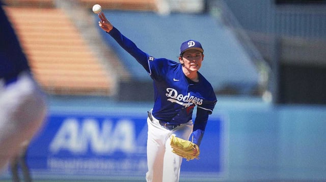 Aug 8, 2025; Los Angeles, California, USA; Los Angeles Dodgers pitcher Roki Sasaki (11) throws before the game against the Toronto Blue Jays at Dodger Stadium. Mandatory Credit: Kirby Lee-Imagn Images