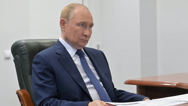 Russia's President Vladimir Putin attends a meeting with Magadan region's Governor Sergei Nosov 