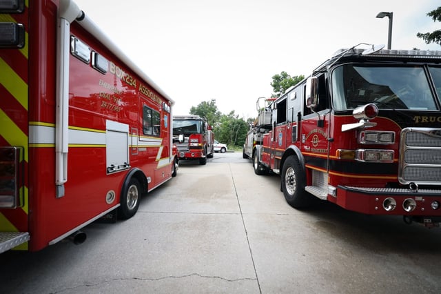 A lineup of new Baltimore County fire trucks is parked outside Woodlawn Fire Station in Baltimore, Md., showcasing part of a historic $40 million fleet upgrade aimed at enhancing firefighter safety and emergency response. (Nia Meyers/Staff)
