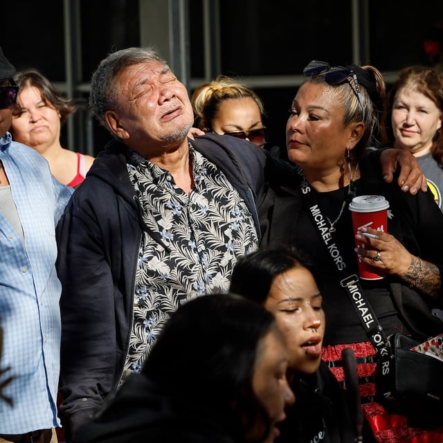 Albert Shingoose, father of Ashlee Shingoose, who was murdered by Jeremy Skibicki, is comforted outside the Manitoba Law Courts before they entered to present victim impact statements to the court in Winnipeg, Friday, Aug. 15, 2025. THE CANADIAN PRESS/John Woods