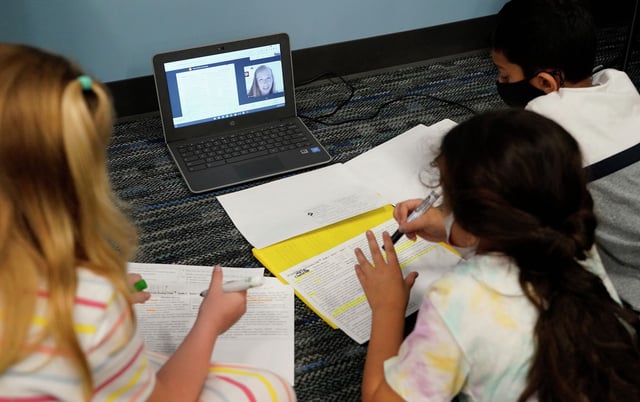 Students attend virtual classes in Tomball during the pandemic. 