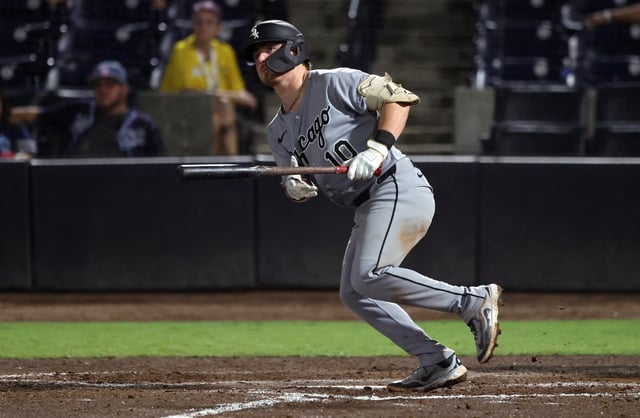 Jul 21, 2025; St. Petersburg, Florida, USA;  Chicago White Sox shortstop Chase Meidroth (10) doubles during the ninth inning against the Tampa Bay Rays at George M. Steinbrenner Field. Mandatory Credit: Kim Klement Neitzel-Imagn Images/File Photo