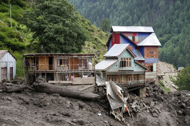Buildings damaged by Thursday's flash floods are seen in Chositi village, Kishtwar district, Indian-controlled Kashmir, Friday, Aug. 15, 2025. (AP Photo/Channi Anand)