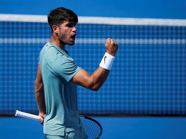 Aug 15, 2025; Cincinnati, OH, USA;  Carlos Alcaraz (ESP) reacts after returning a shot against Andrey Rublev (RUS) during the Cincinnati Open at the Lindner Family Tennis Center. Mandatory Credit: Aaron Doster-Imagn Images