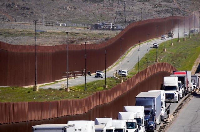 US Troops working between the border fence next to the commercial traffic near the Otay Mesa crossing in Colonia Perimetral Nte on Tuesday, March 4, 2025 in Tijuana, California. (Alejandro Tamayo / The San Diego Union-Tribune)