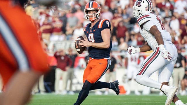 Dec 31, 2024; Orlando, FL, USA; Illinois Fighting Illini quarterback Luke Altmyer (9) gets ready to throw the ball against the South Carolina Gamecocks in the first quarter at Camping World Stadium. Mandatory Credit: Jeremy Reper-Imagn Images