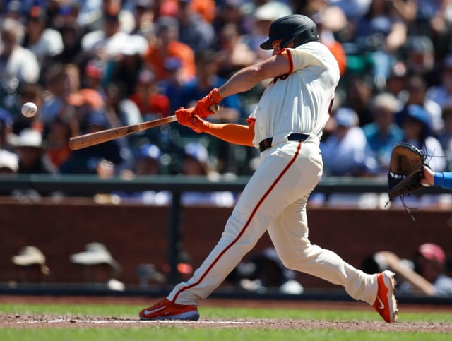 San Francisco Giants’ Matt Chapman (26) hits a single against the Los Angeles Dodgers in the ninth inning at Oracle Park in San Francisco, Calif., on Sunday, July 13, 2025. (Nhat V. Meyer/Bay Area News Group)