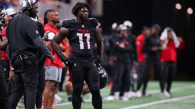 Aug 8, 2025; Atlanta, Georgia, USA; Atlanta Falcons linebacker Jalon Walker (11) on the sideline against the Detroit Lions in the second quarter at Mercedes-Benz Stadium. Mandatory Credit: Brett Davis-Imagn Images