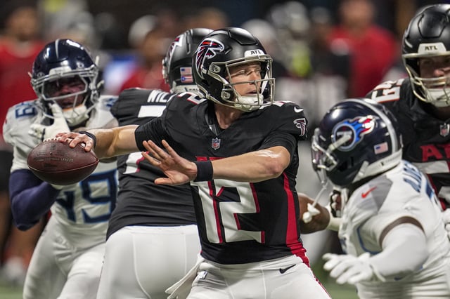 Aug 15, 2025; Atlanta, Georgia, USA; Atlanta Falcons quarterback Easton Stick (12) passes the ball against the Tennessee Titans at Mercedes-Benz Stadium. Mandatory Credit: Dale Zanine-Imagn Images