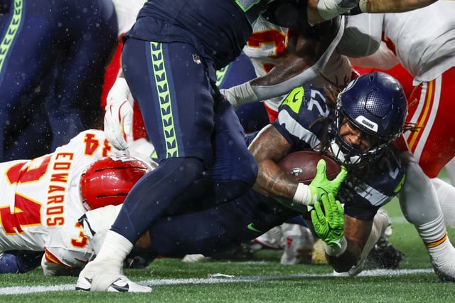 Aug 15, 2025; Seattle, Washington, USA; Seattle Seahawks running back Damien Martinez (22) rushes for a touchdown against the Kansas City Chiefs during the third quarter at Lumen Field. Mandatory Credit: Joe Nicholson-Imagn Images