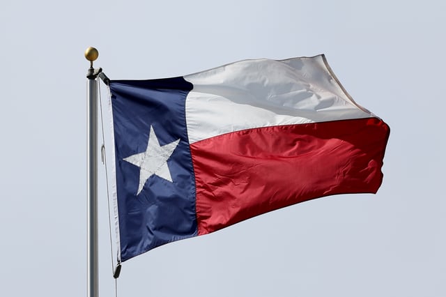 Stock photograph showing the Texas flag before the game between the Houston Cougars and the Texas Longhorns at TDECU Stadium on October 21, 2023 in Houston, Texas.