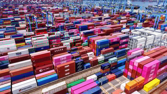 Containers are seen at the port in Qingdao, in China�s eastern Shandong province on August 11, 2025. (Photo by AFP) / China OUT