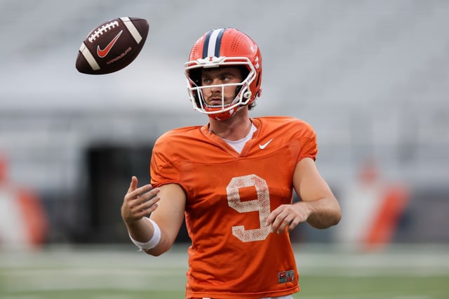 Illinois quarterback Luke Altmyer handles a football during practice at Memorial Stadium on Aug. 7, 2025, in Champaign. (Armando L. Sanchez/Chicago Tribune)