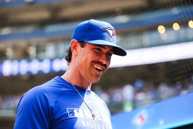 TORONTO, CANADA - AUGUST 2: Shane Bieber #57 of the Toronto Blue Jays smiles ahead of their MLB game against the Kansas City Royals at Rogers Centre on August 2, 2025 in Toronto, Ontario, Canada.