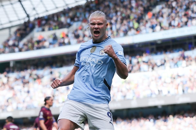 Erling Haaland of Manchester City celebrates after scoring his side&#39;s first goal from the penalty spot during the Premier League match between Manchester City FC and Ipswich Town FC at Etihad Stadium on August 24, 2024 in Manchester, England.